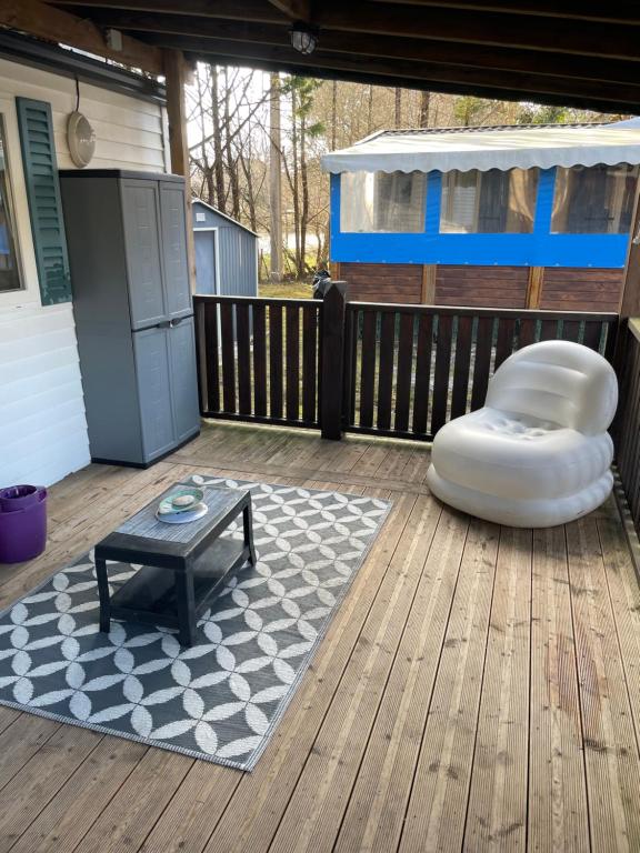Posezení v ubytování Bungalow tout confort