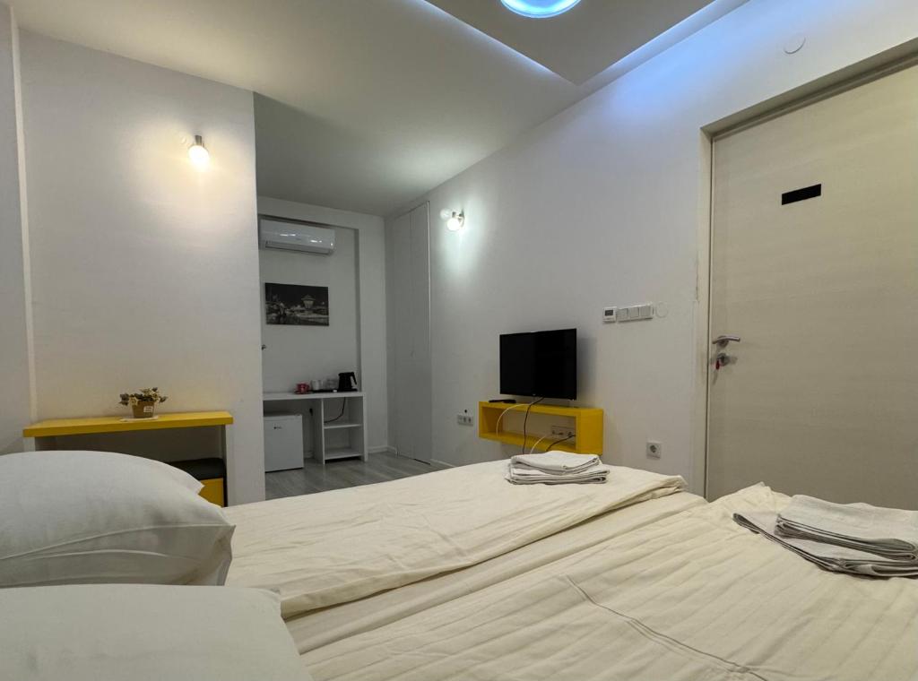 Postel nebo postele na pokoji v ubytování Guesthouse Biser