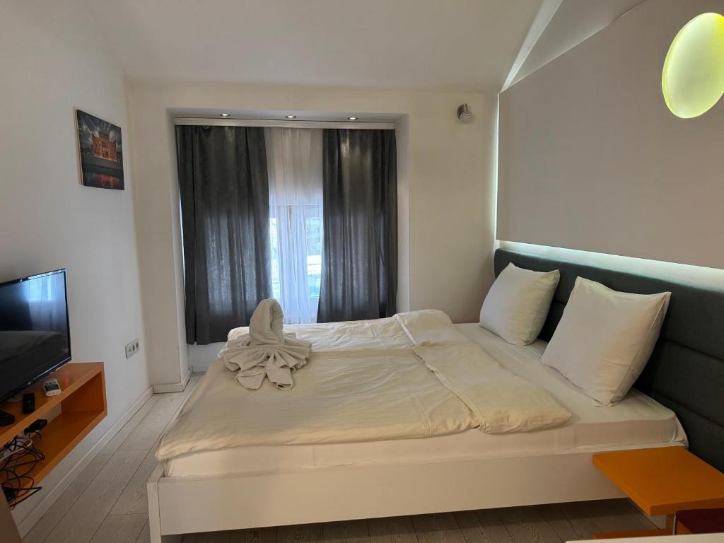 Postel nebo postele na pokoji v ubytování Guesthouse Biser