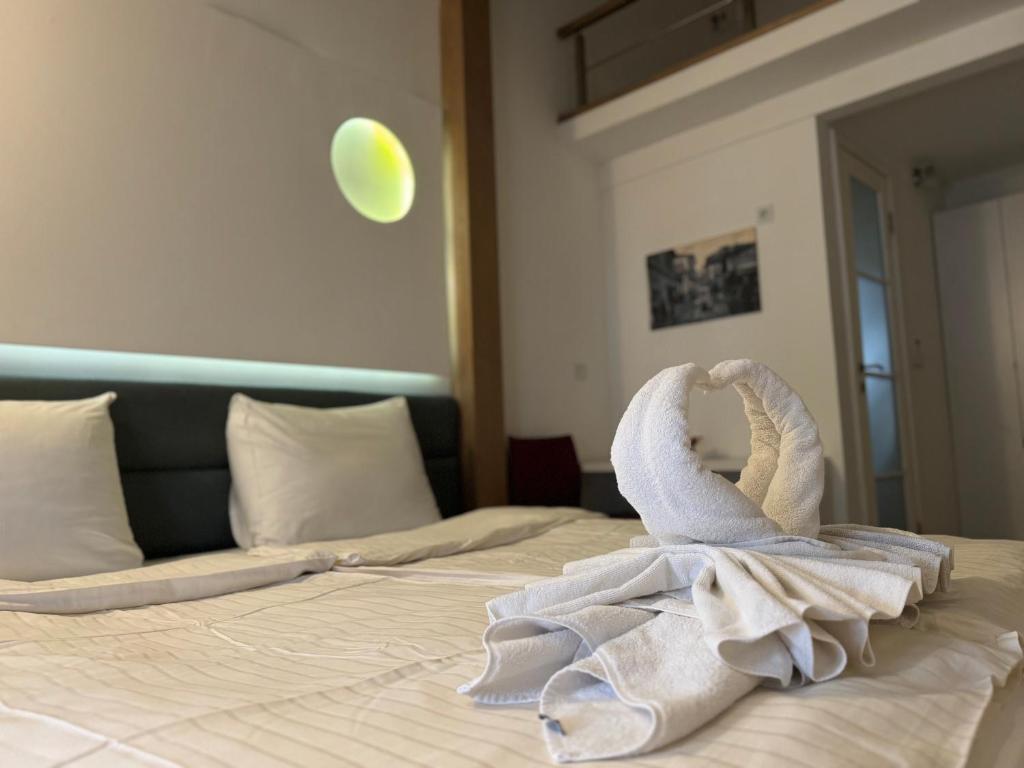 Postel nebo postele na pokoji v ubytování Guesthouse Biser