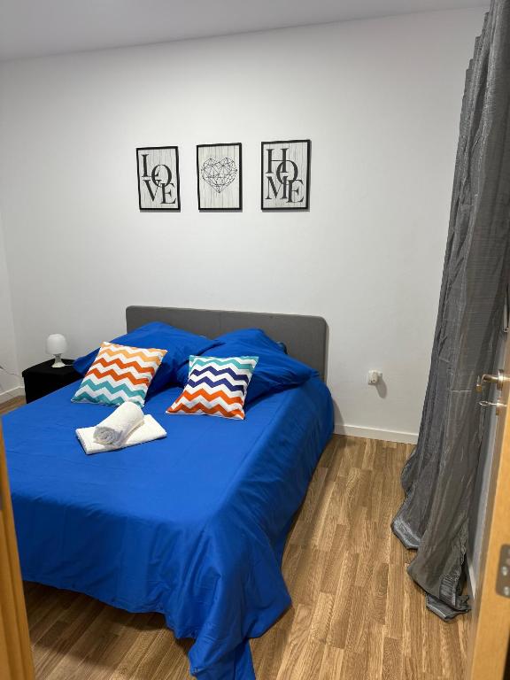 Postel nebo postele na pokoji v ubytování Sao Lourenco