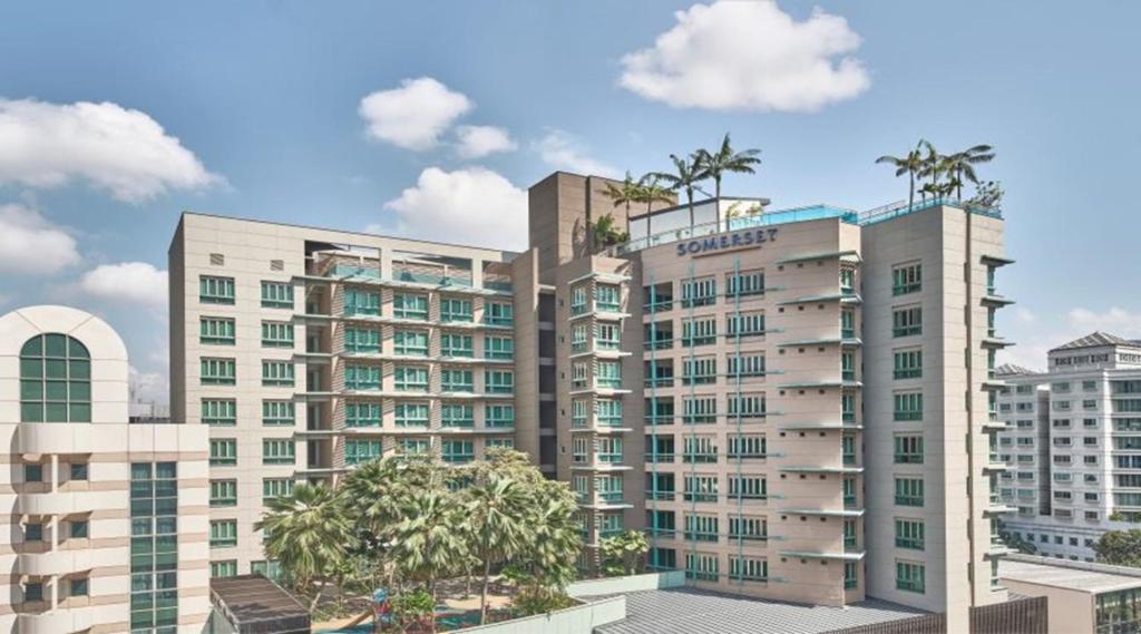 a rendering of a building with palm trees on top at Somerset Bencoolen Singapore in Singapore