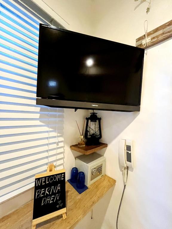 TV a/nebo společenská místnost v ubytování Lugar Bonito Hotel
