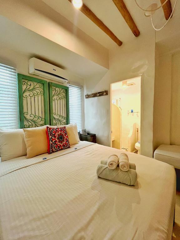 Postel nebo postele na pokoji v ubytování Lugar Bonito Hotel