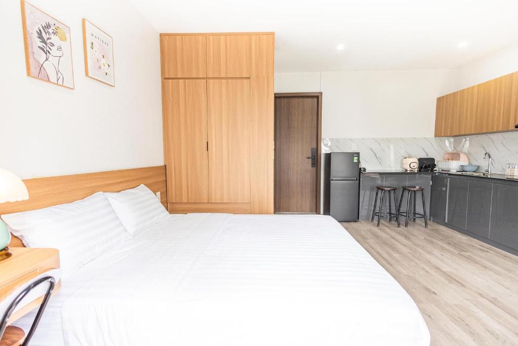 Kuchyň nebo kuchyňský kout v ubytování Fame Apartment