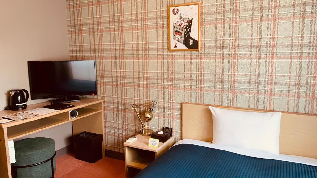 TV a/nebo společenská místnost v ubytování Sun Hotel Funabashi