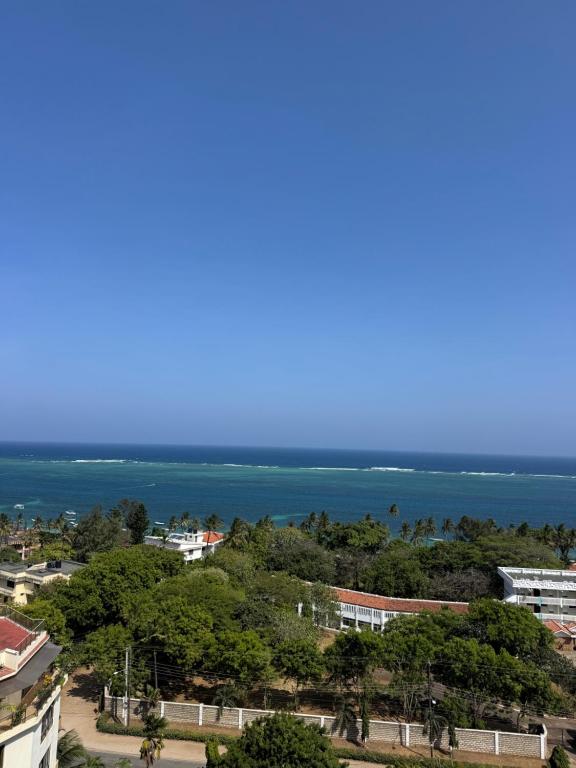 a view of the ocean from a building at Kheyre Nyali Ocean View Two Bedrooms Apartments in Mombasa