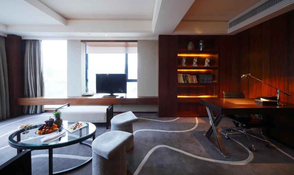 TV a/nebo společenská místnost v ubytování DW Hotel