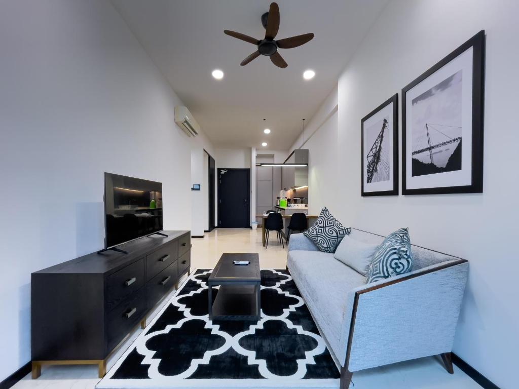 TV a/nebo společenská místnost v ubytování Opus Residences by Wakely Kuala Lumpur