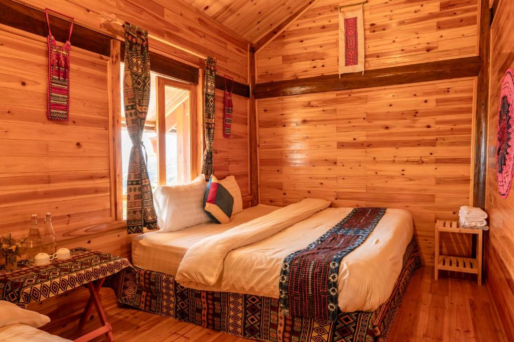 Postel nebo postele na pokoji v ubytování Hmong Farmstay