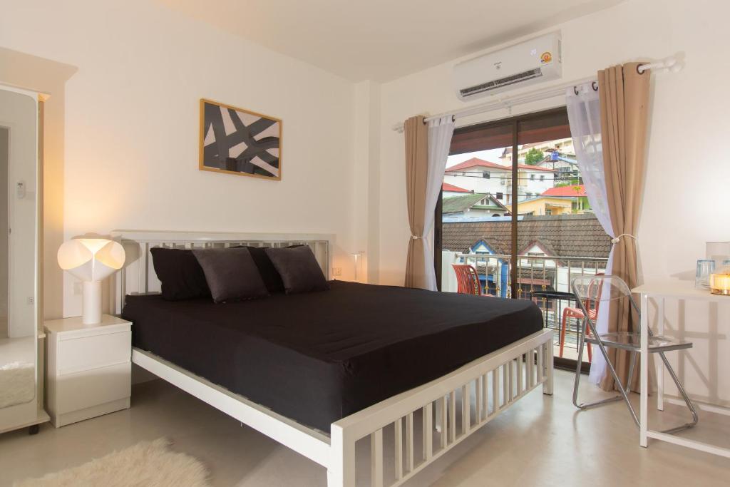 Postel nebo postele na pokoji v ubytování Place Hotel