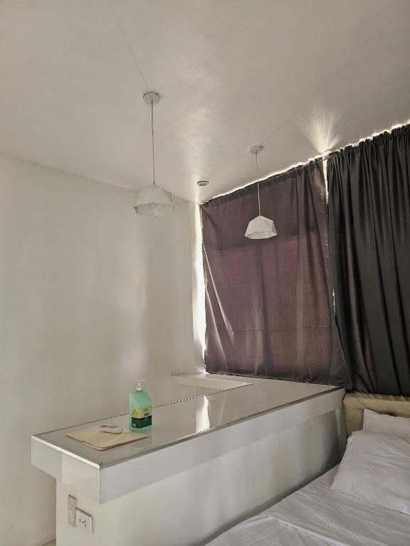 Postel nebo postele na pokoji v ubytování Lio Palm Villas