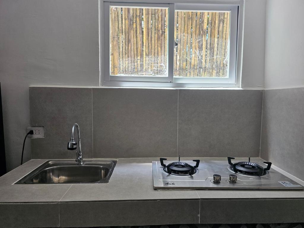 Kuchyň nebo kuchyňský kout v ubytování Lio Palm Villas