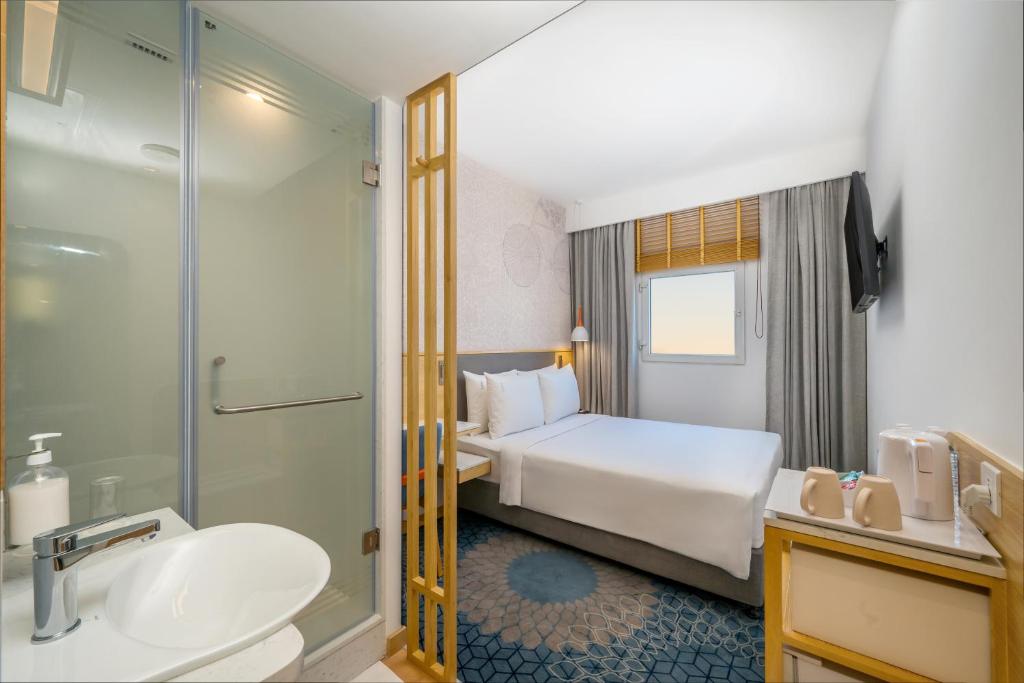 Postel nebo postele na pokoji v ubytování Holiday Inn Express Greater Noida Knowledge Park by IHG