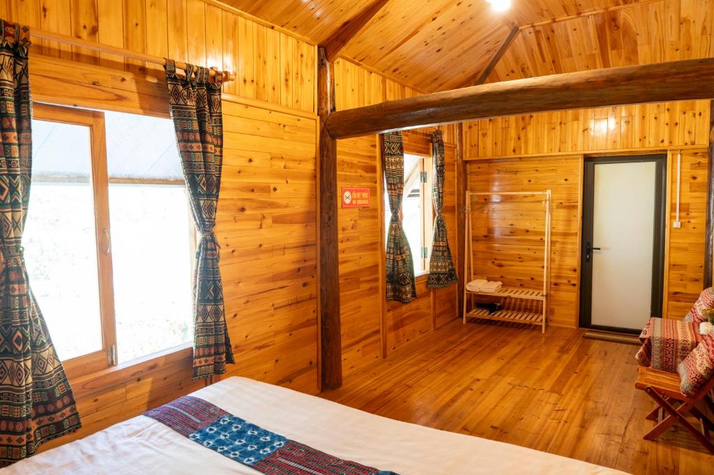 Postel nebo postele na pokoji v ubytování Hmong Farmstay