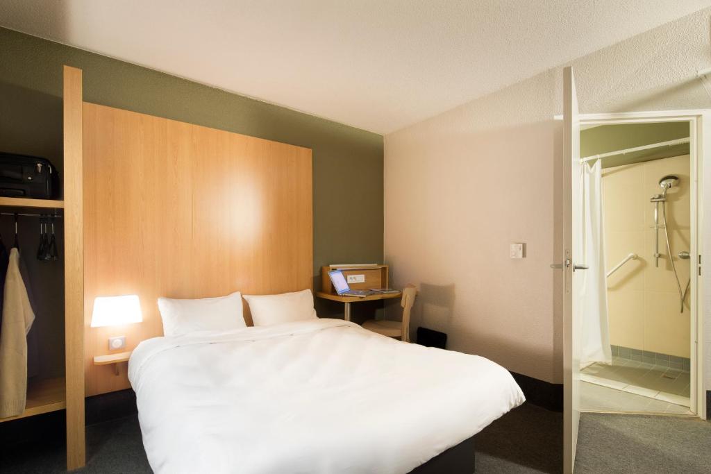 Postel nebo postele na pokoji v ubytování B&B HOTEL Castres Centre Gambetta