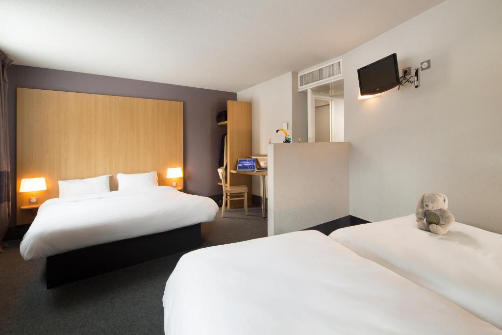Postel nebo postele na pokoji v ubytování B&B HOTEL Castres Centre Gambetta