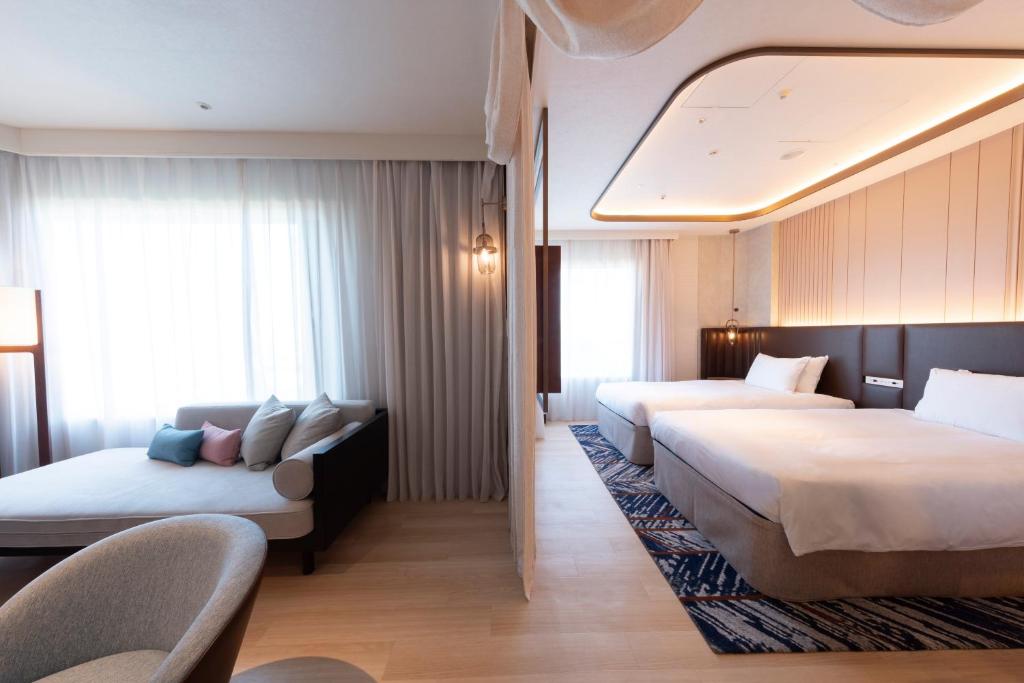 Postel nebo postele na pokoji v ubytování Hotel Springs Makuhari Premier