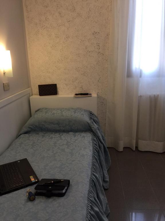 Postel nebo postele na pokoji v ubytování New H Marte 81