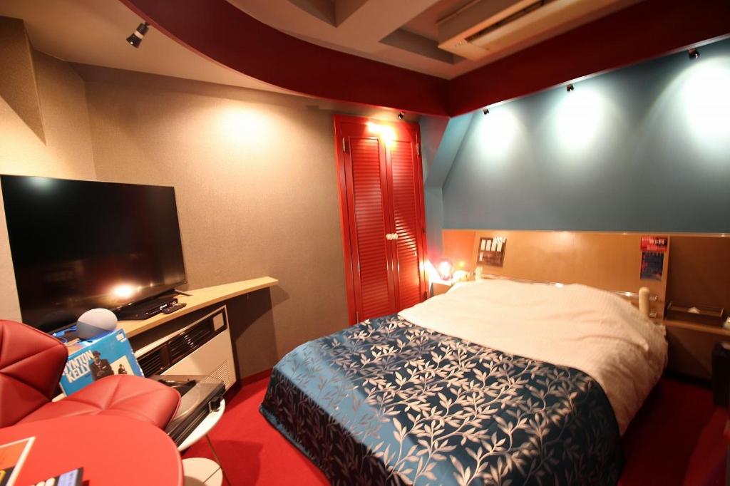 Postel nebo postele na pokoji v ubytování Hotel OLDSWING Adult Only