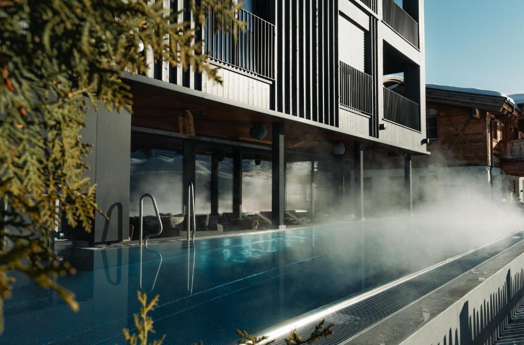 Bazén v ubytování Boutique Hotel Das Rivus nebo v jeho okolí