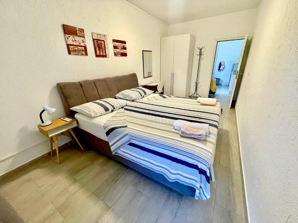 Posteľ alebo postele v izbe v ubytovaní Charming Funtana apartments + Free Bikes