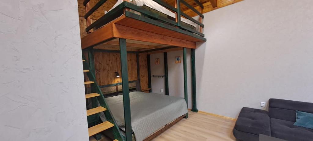 Palanda nebo palandy na pokoji v ubytování Apartmány za Plotem