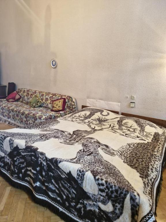 Postel nebo postele na pokoji v ubytování Guest House Teo