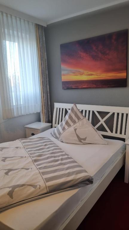Postel nebo postele na pokoji v ubytování Hotel-Cafe-Lindow