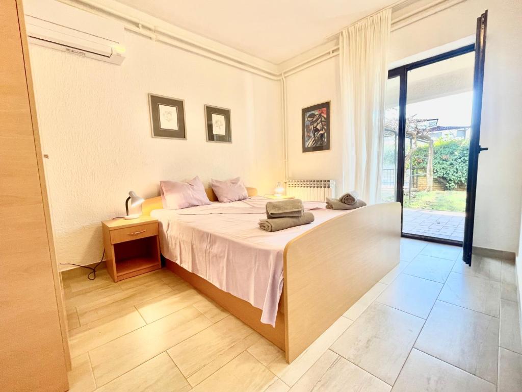 Posteľ alebo postele v izbe v ubytovaní Charming Funtana apartments + Free Bikes