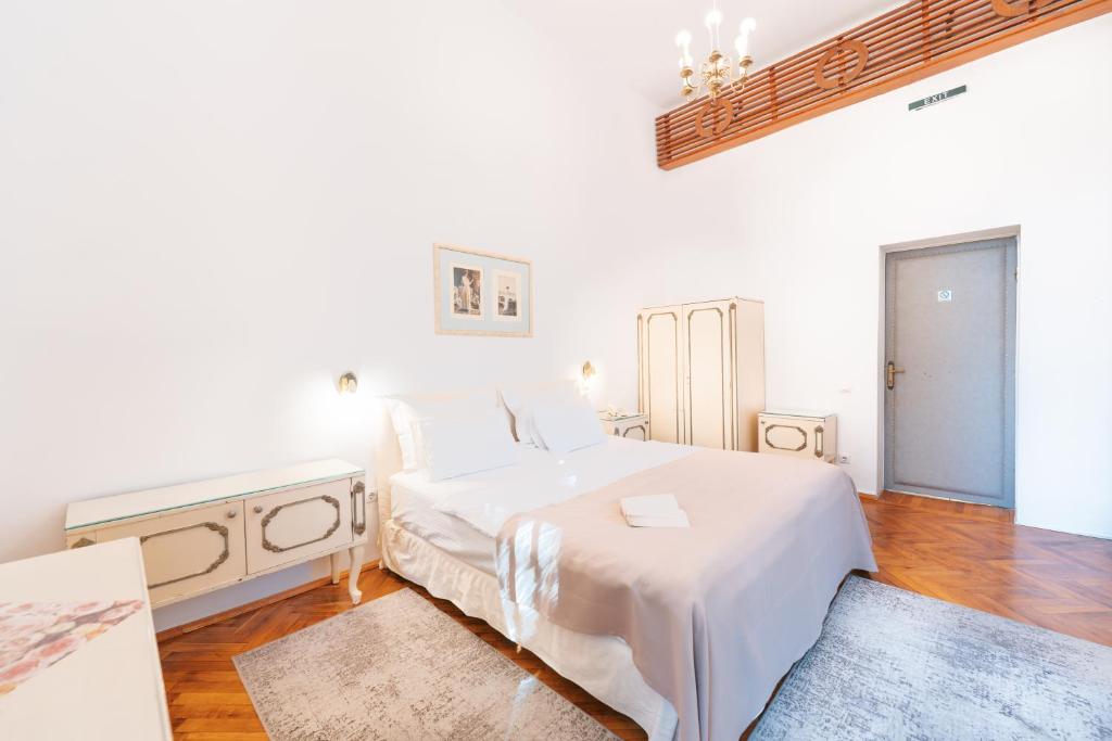 Postel nebo postele na pokoji v ubytování Vila Camelia