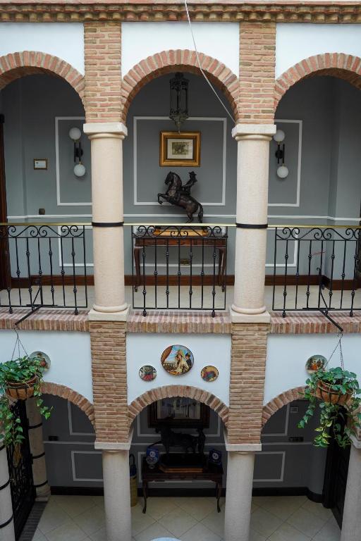 an archway in the middle of a building at Hotel Boutique Casa Veracruz in Estepona