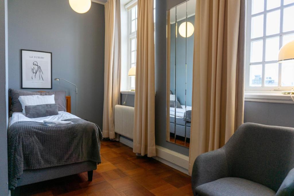 Postel nebo postele na pokoji v ubytování Furunäset Hotell & Konferens