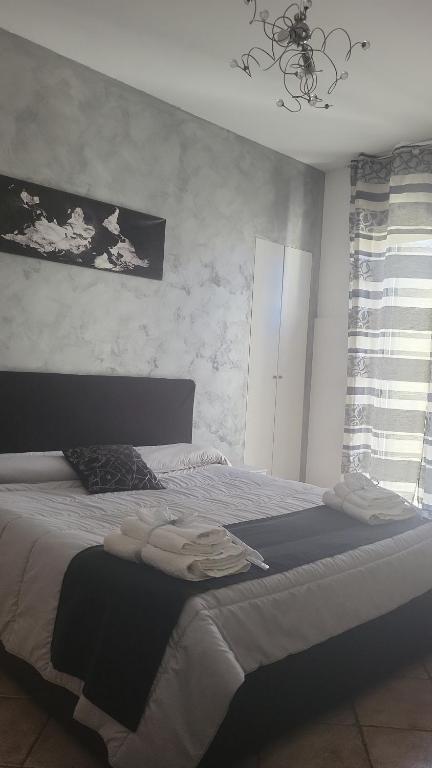 Postel nebo postele na pokoji v ubytování B&B Dimora del centro