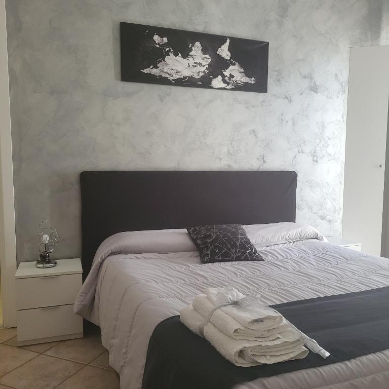 Postel nebo postele na pokoji v ubytování B&B Dimora del centro