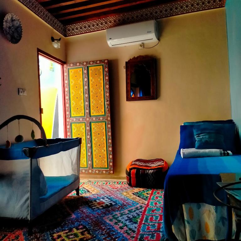 Postel nebo postele na pokoji v ubytování Casa Aya Medina