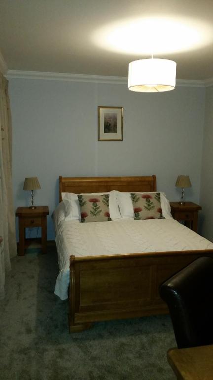 Postel nebo postele na pokoji v ubytování B&B Ronan House