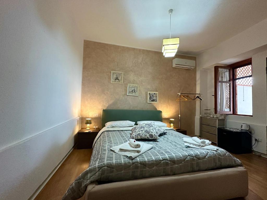 Postel nebo postele na pokoji v ubytování B&B Verzavò
