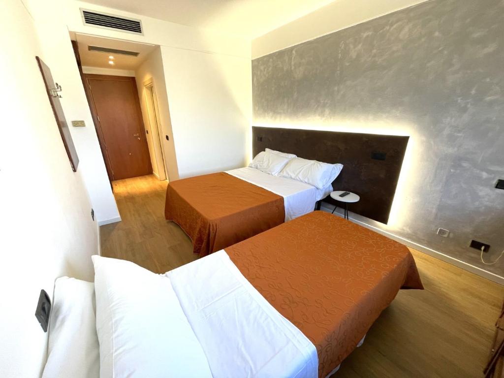 Postel nebo postele na pokoji v ubytování Hotel Sirena - B&B