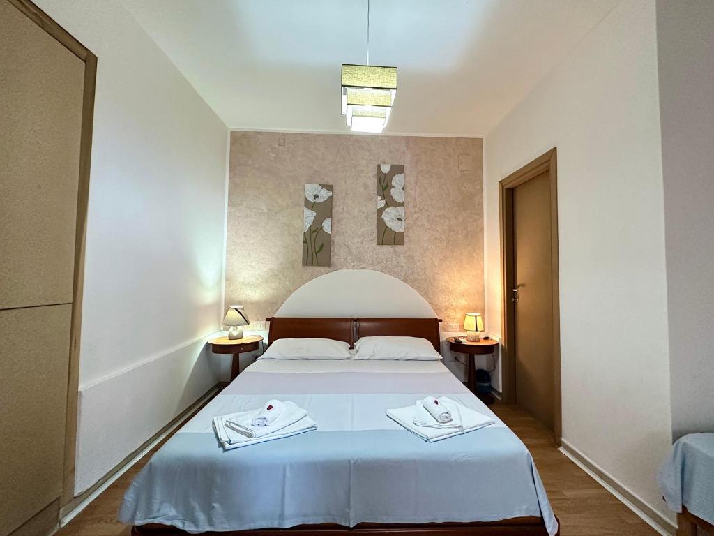 Postel nebo postele na pokoji v ubytování B&B Verzavò