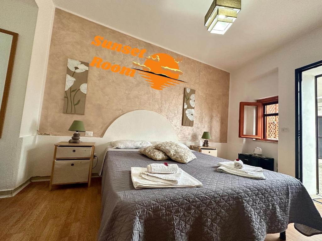 Postel nebo postele na pokoji v ubytování B&B Verzavò