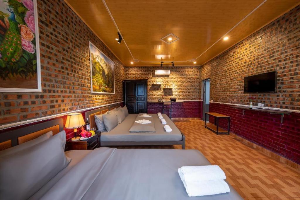 Postel nebo postele na pokoji v ubytování Cat Ba Spring Homestay