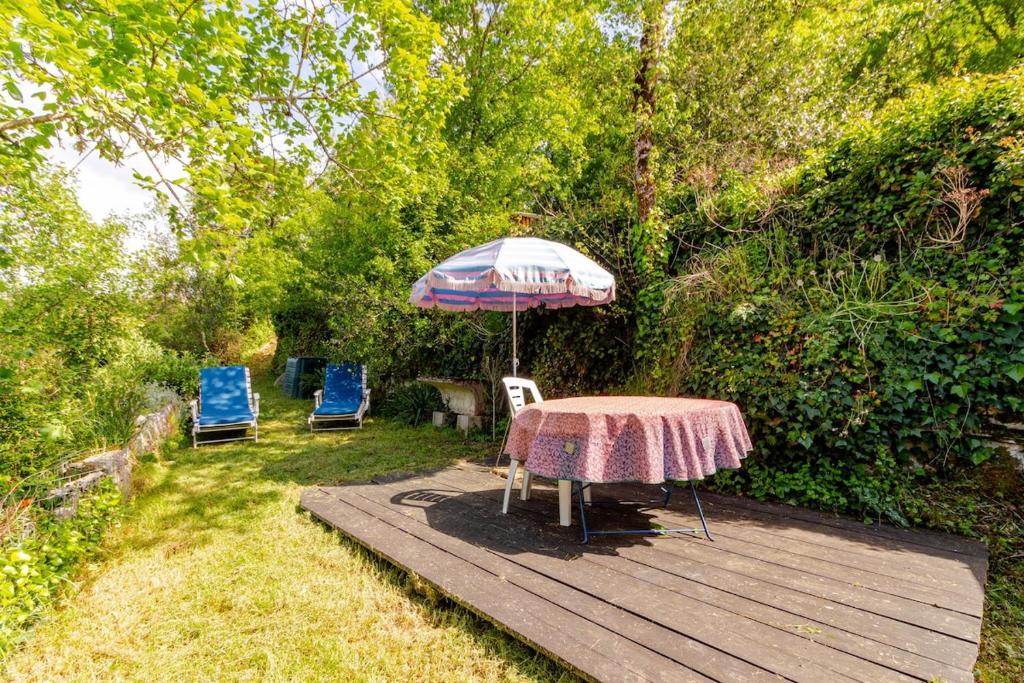 Zahrada ubytování Maisonnette dans un écrin de pierre et de verdure
