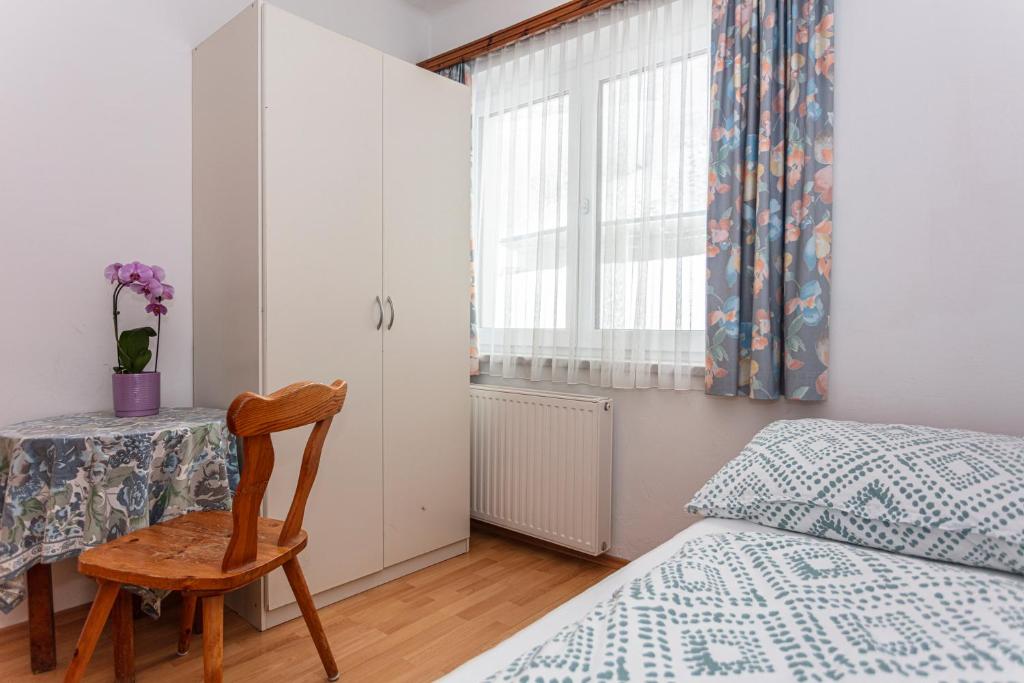 Postel nebo postele na pokoji v ubytování Ferienhaus Alpenrose