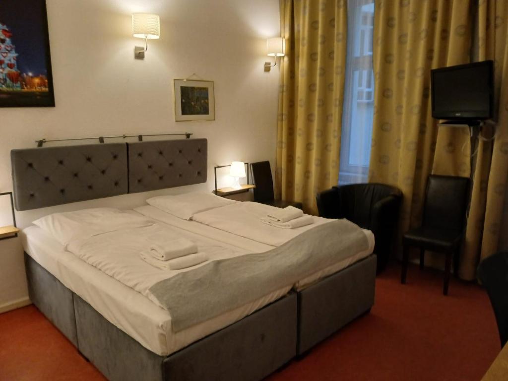 Postel nebo postele na pokoji v ubytování Hotel Amelie Berlin
