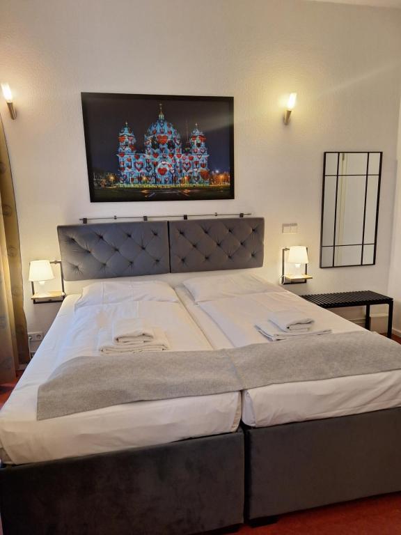 Postel nebo postele na pokoji v ubytování Hotel Amelie Berlin