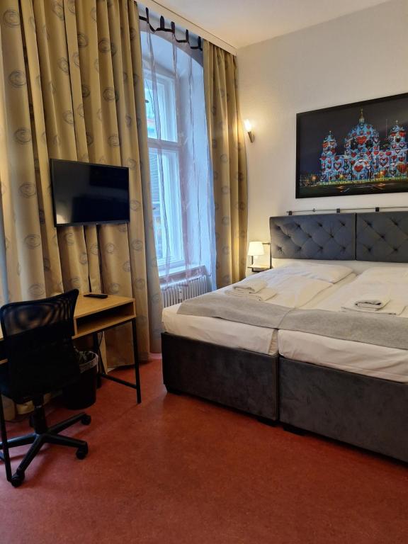 Postel nebo postele na pokoji v ubytování Hotel Amelie Berlin