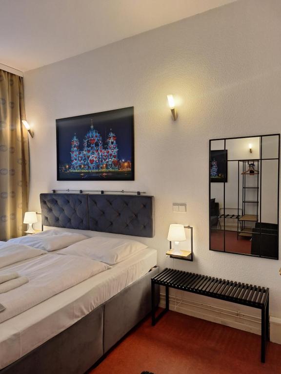 Postel nebo postele na pokoji v ubytování Hotel Amelie Berlin