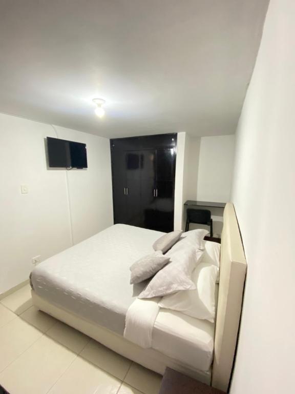 Postel nebo postele na pokoji v ubytování CAS V&B Apartamentos