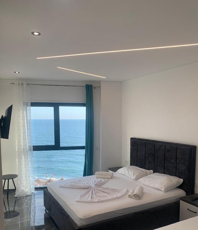 Postel nebo postele na pokoji v ubytování LISI apartments